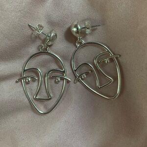 silver abstract face earrings